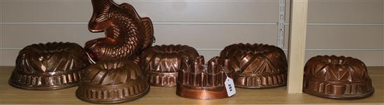 Seven copper jelly moulds